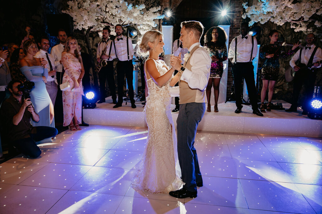 A couple having their first dance at Hatfield House