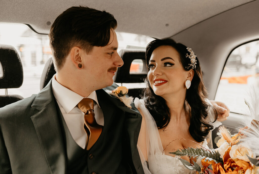 A newly married couple in a London taxi