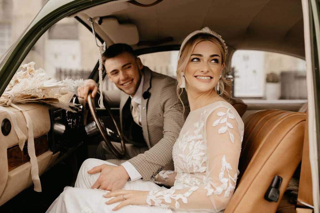 Romantic couple portraits in a vintage car. Bath elopement photography