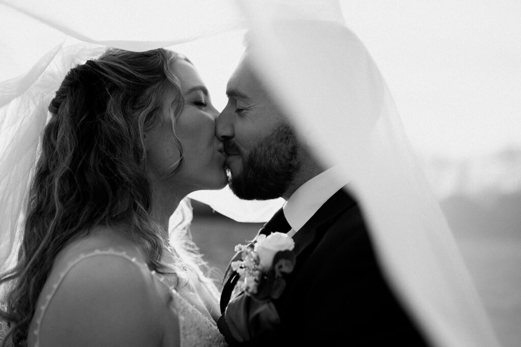 Lillibrooke Manor wedding photography couple portrait under the veil