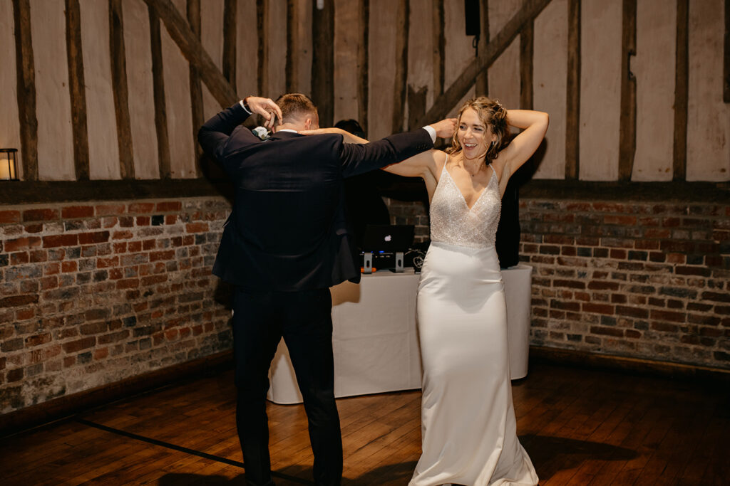 A couple having their first dance at Lillibrooke Manor wedding venue