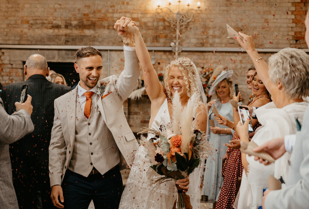 Botley Hill Barn wedding confetti exit down the aisle