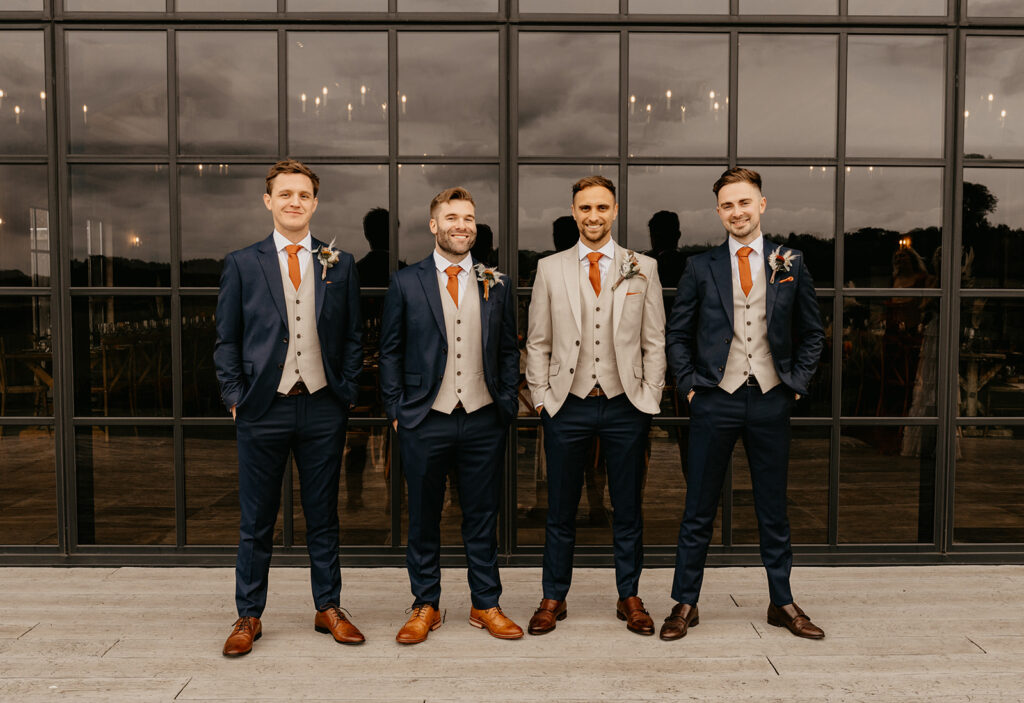A groom and groomsmen at Botley Hill Barn