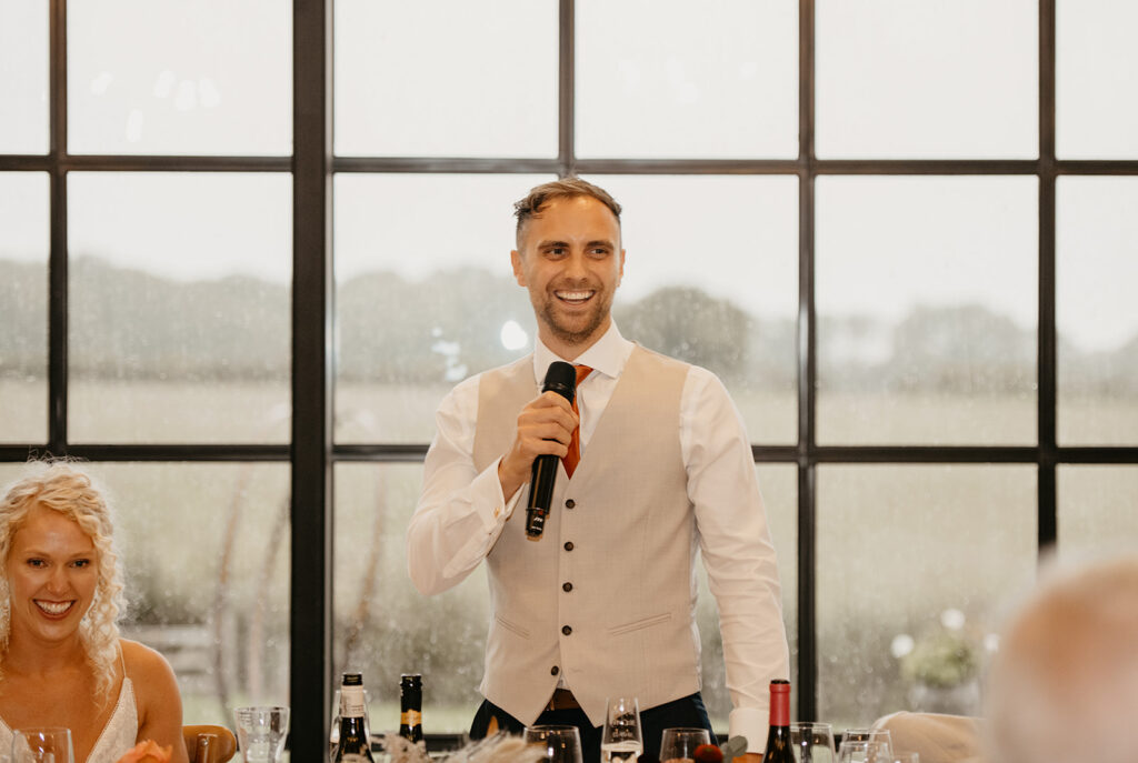 A groom giving his speech at Botley Hill Barn wedding venue