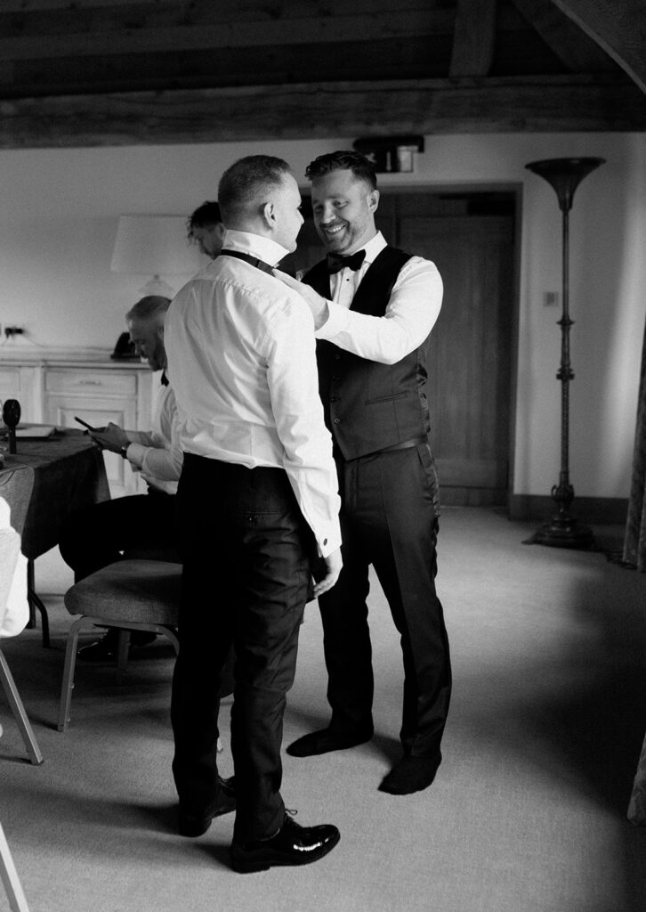 A groom getting ready for his wedding at Great Fosters