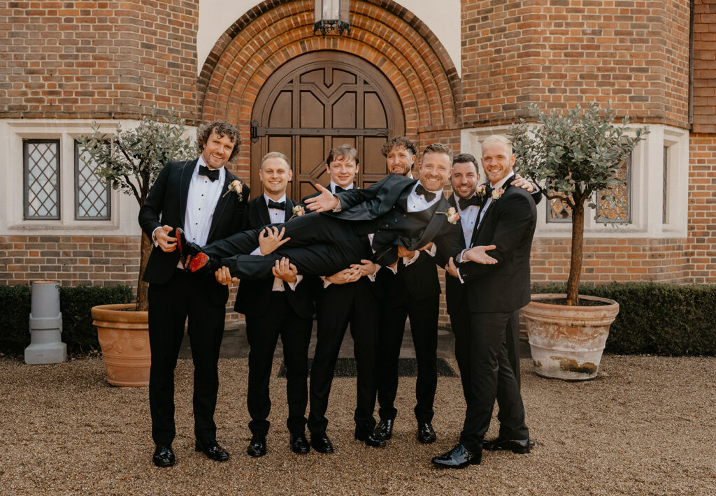 A groom and his groomsmen at Great Fosters