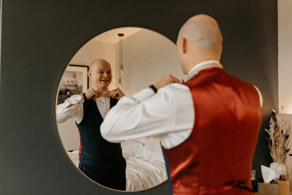 A groom getting ready for his wedding at Primrose Hill Farm