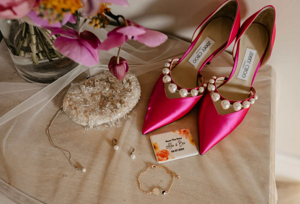 Pink Jimmy Choo wedding heels with pearls